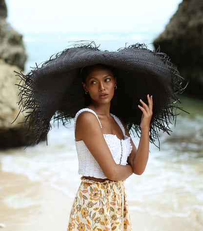 AMORA Oversized Woven Straw Hat in Black by BrunnaCo