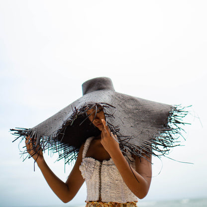 AMORA Oversized Woven Straw Hat in Black by BrunnaCo