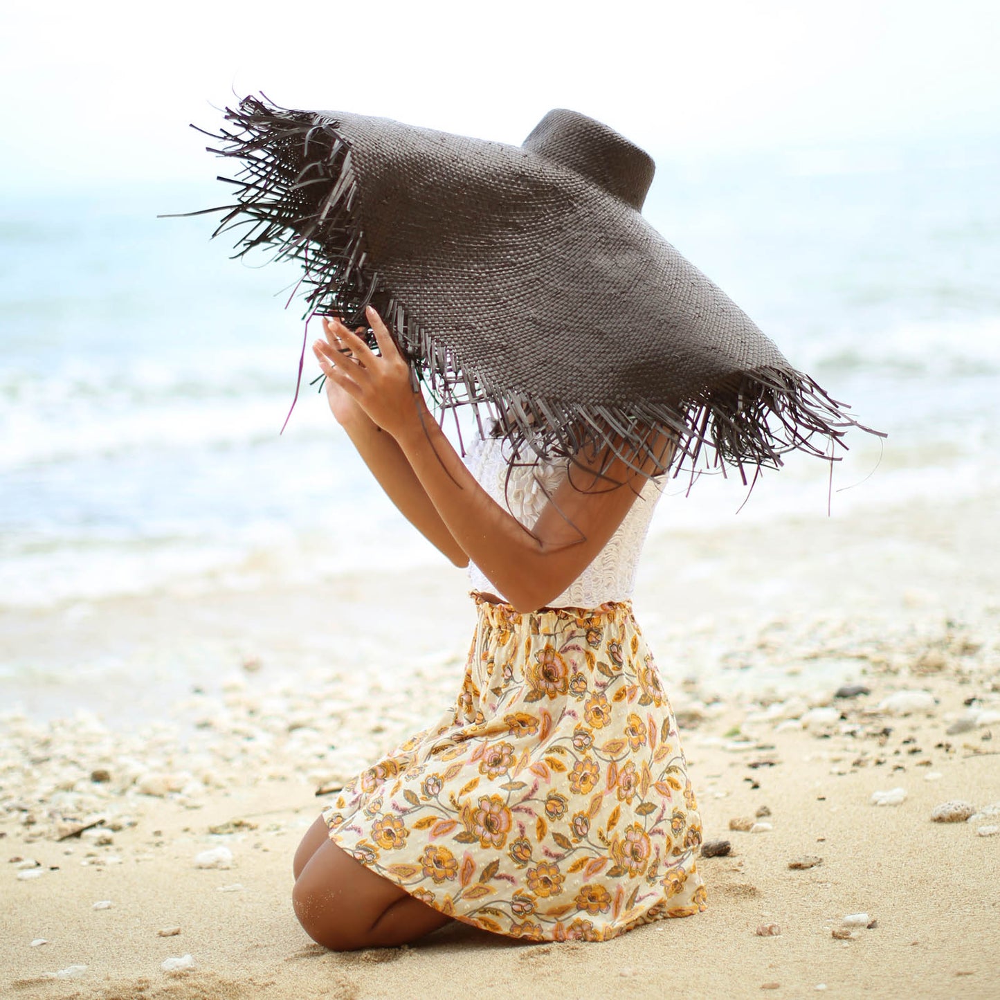 AMORA Oversized Woven Straw Hat in Black by BrunnaCo