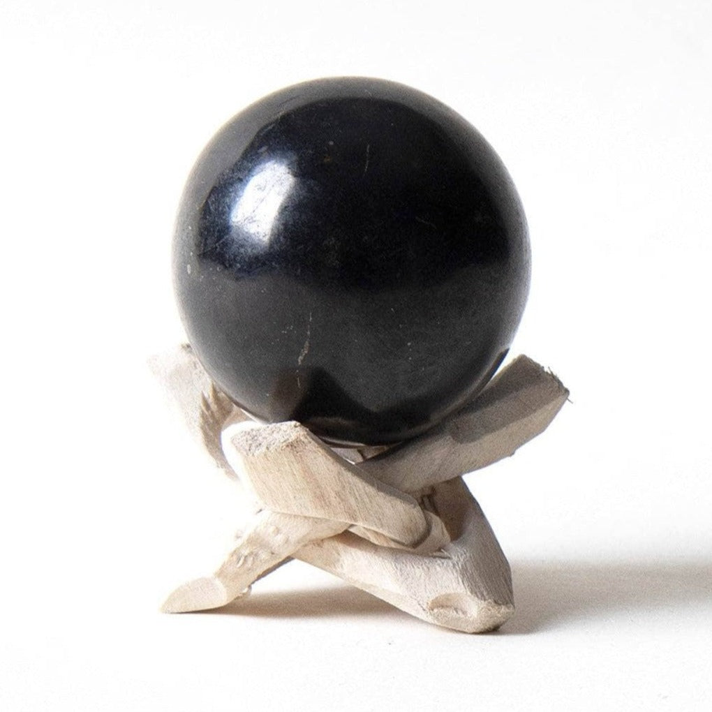 Black Tourmaline Sphere with Tripod by Tiny Rituals