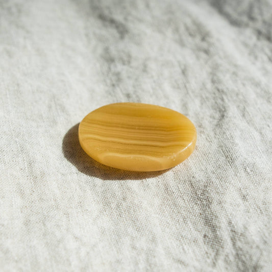 Yellow Calcite Worry Stone by Tiny Rituals