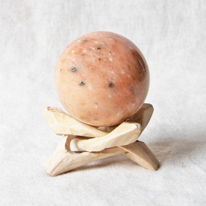 Orange Calcite Sphere with Tripod by Tiny Rituals